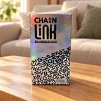 AI-generated styled scene of the Chainlink 450-card game box in a living room.
