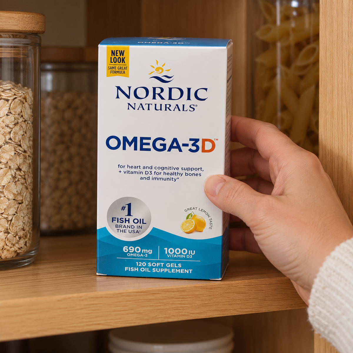 Nordic Naturals Omega-3D 120-soft-gel box being stored on a wooden pantry shelf