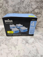 Braun Clean & Renew cartridge packaging on a marble surface