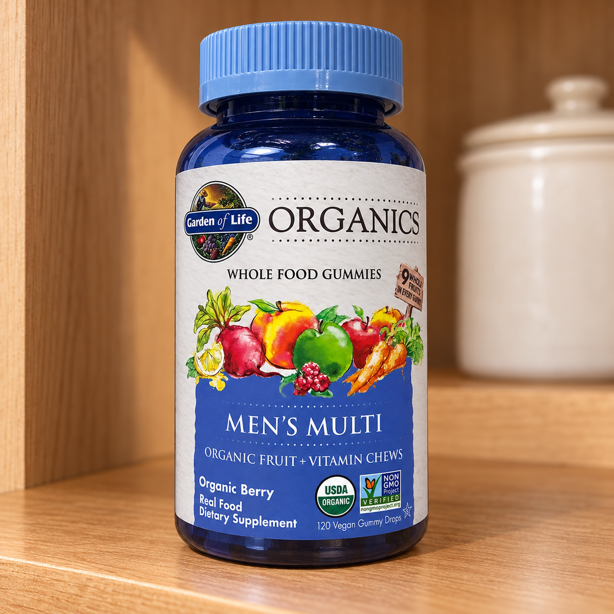 Garden of Life Organics Men's Multi bottle on a clean wood pantry shelf