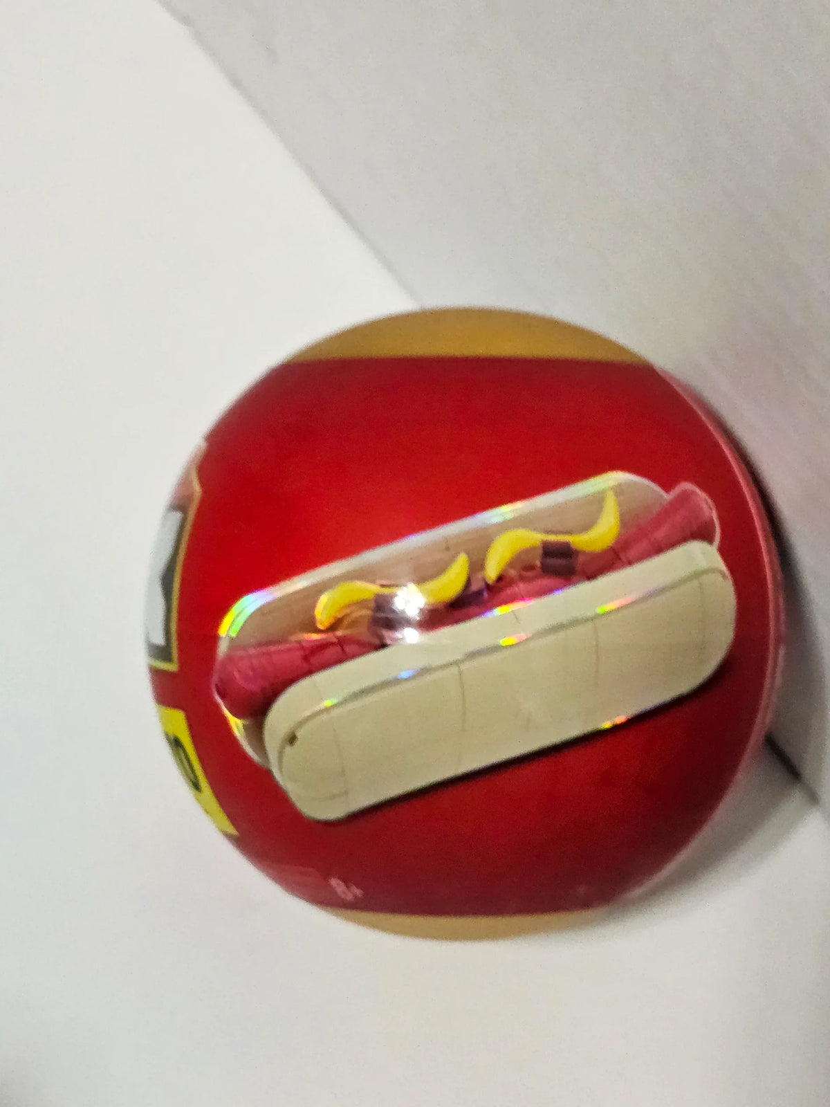 ZURU MAX Premium Snacks Hotdog building-brick capsule in red and gold packaging.