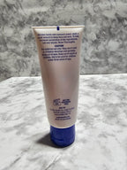 Tube of lotion on a marble surface