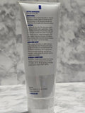 Tube of skincare product on a marble surface