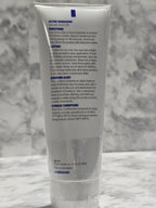 Tube of skincare product on a marble surface
