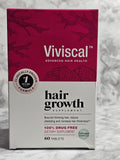 Viviscal hair growth supplement box on a marble surface