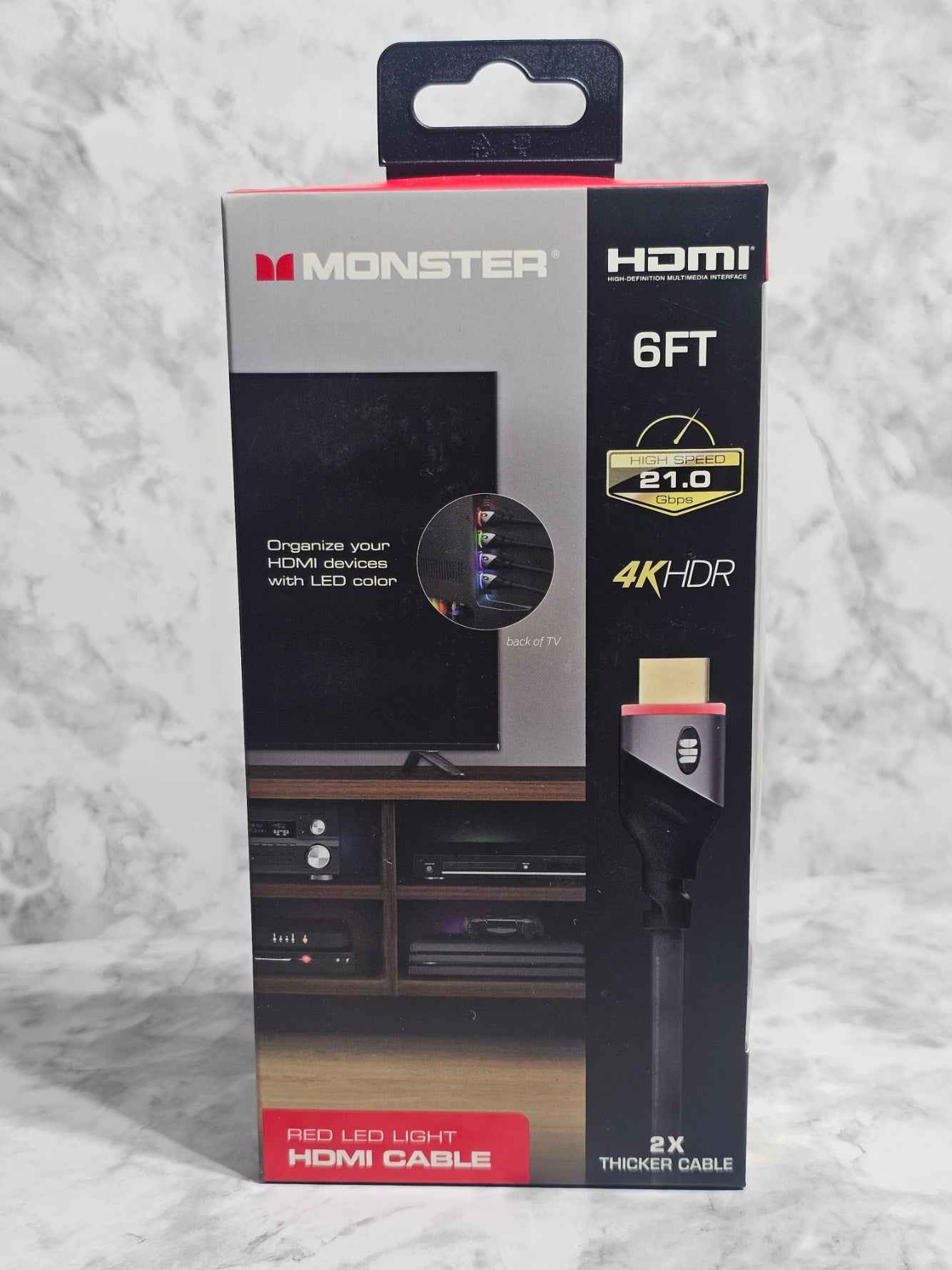 Monster HDMI cable packaging on a textured surface