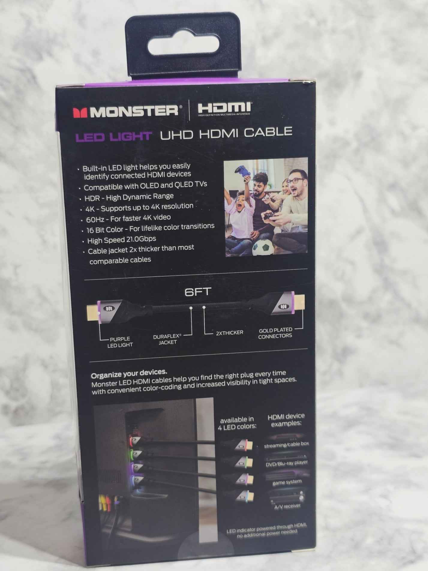 Monster HDMI cable packaging on a textured surface
