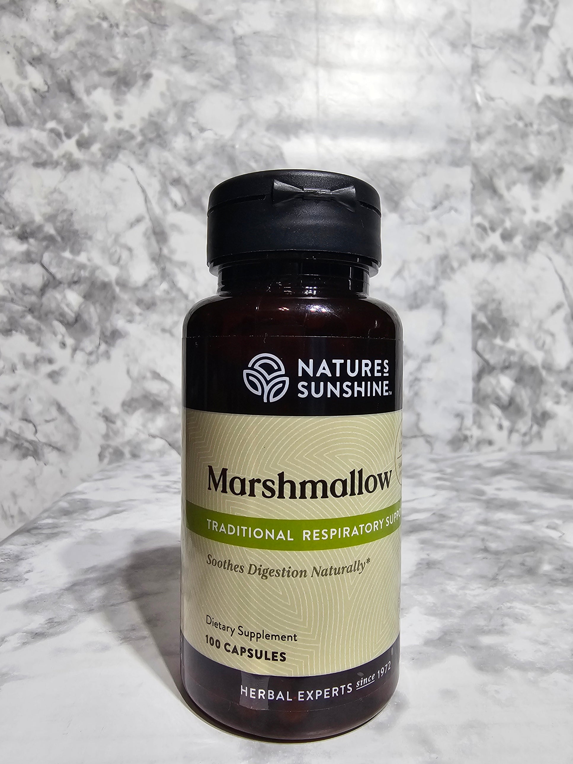 Nature's Sunshine Marshmallow supplement bottle on a marble surface