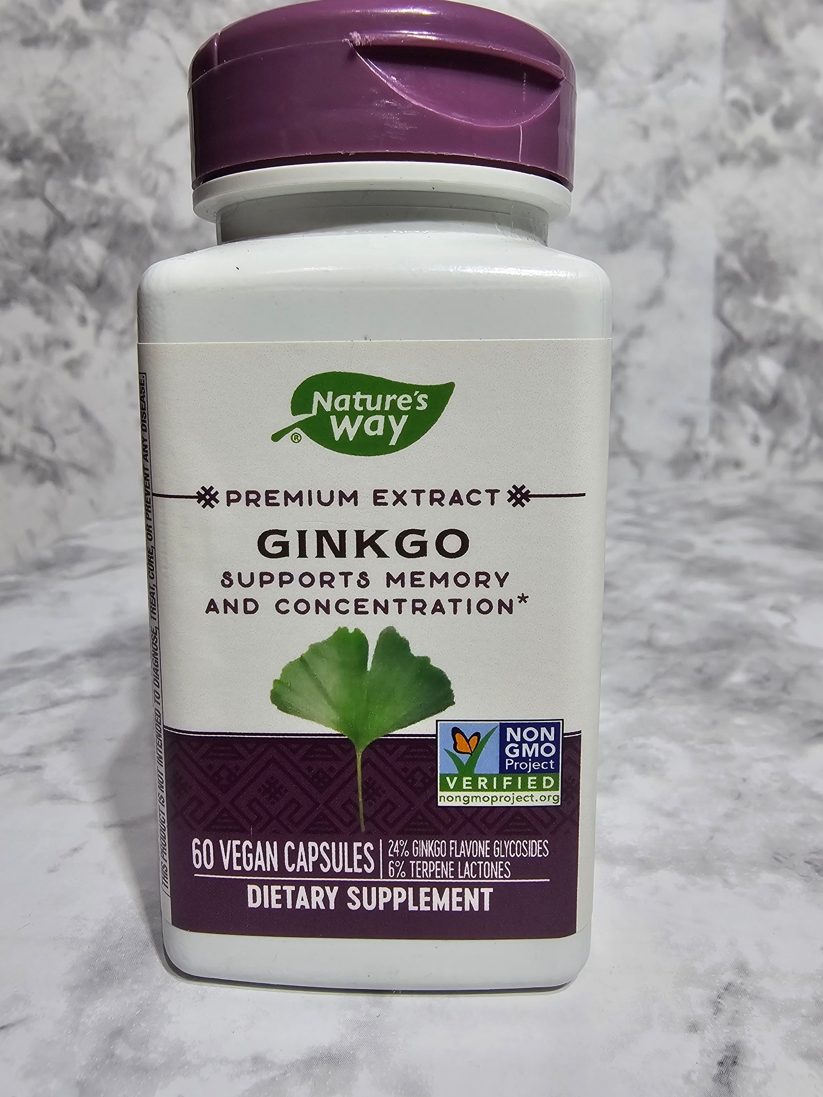Nature's Way Ginkgo supplement bottle on a marble surface
