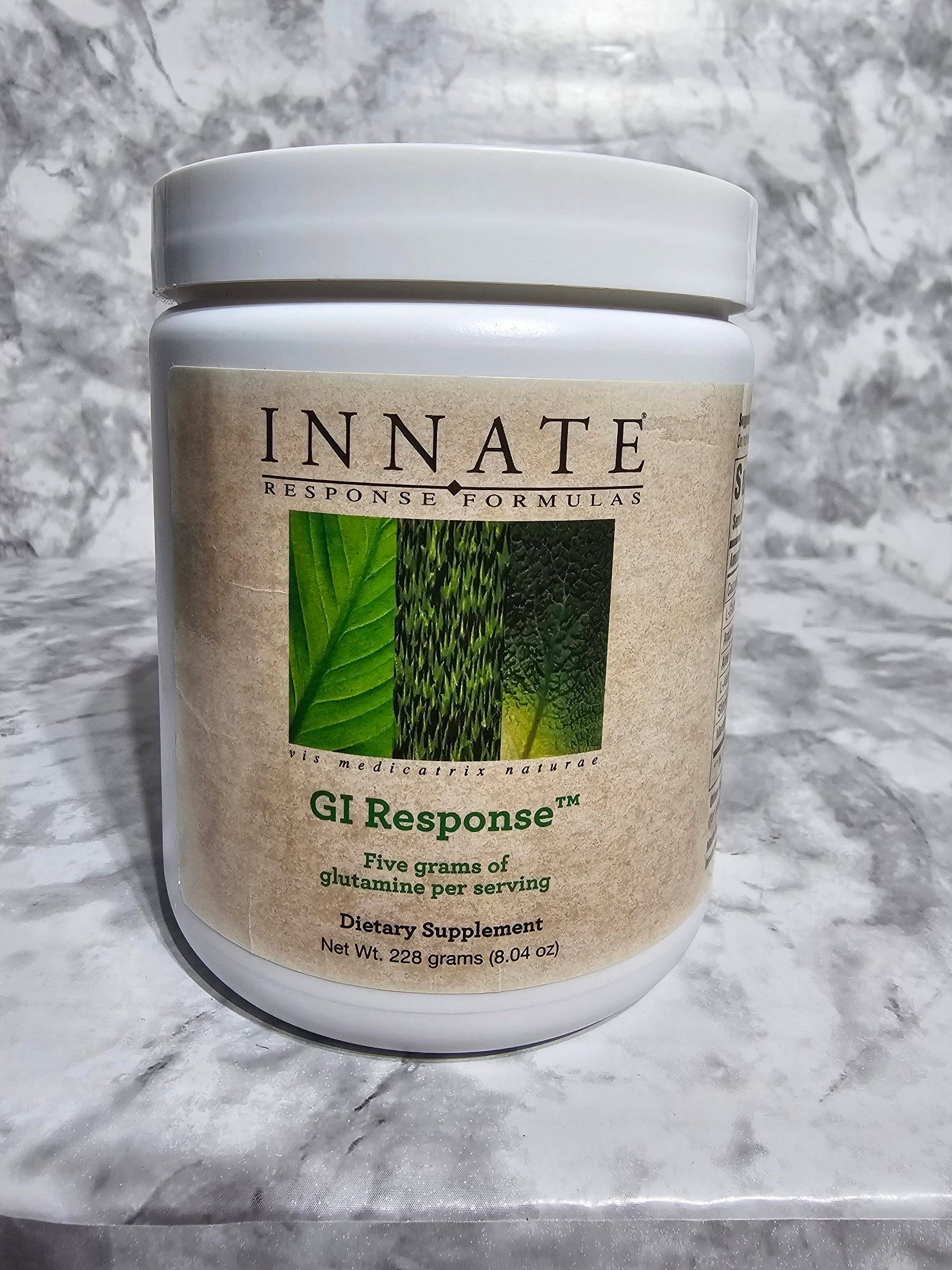 Innate Response Formulas GI Response supplement container on a marble surface