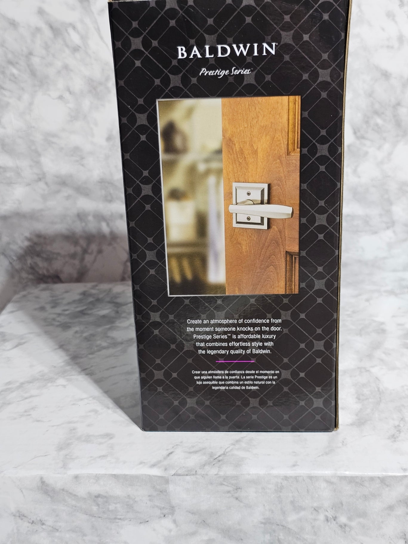 Baldwin hardware packaging on a marble surface