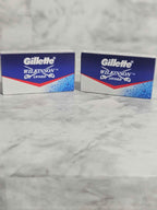 Actual stocked pair of Gillette Wilkinson Sword double-edge blade packs included in the Custom Barber Box