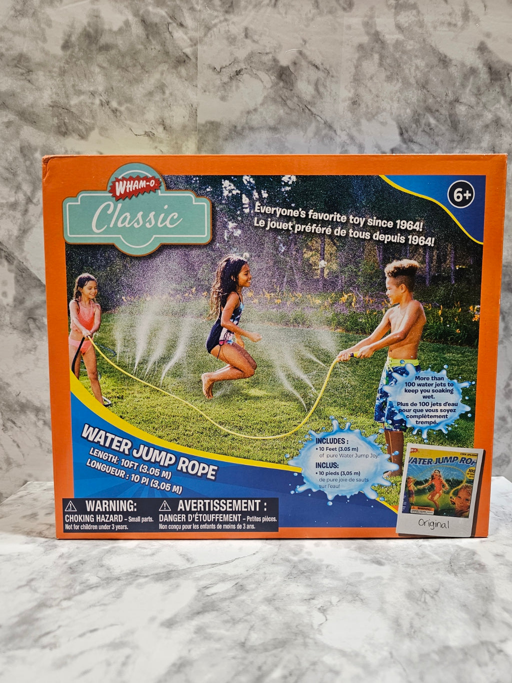 Box of a water jump rope on a marble surface