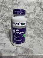 Actual stocked product photo of Natrol Biotin Beauty 10,000 mcg, 100-tablet bottle front.