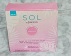 Pink and white box with 'SOL' branding on a gray marble background