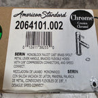 American Standard faucet label with product details and barcode on a cardboard box.