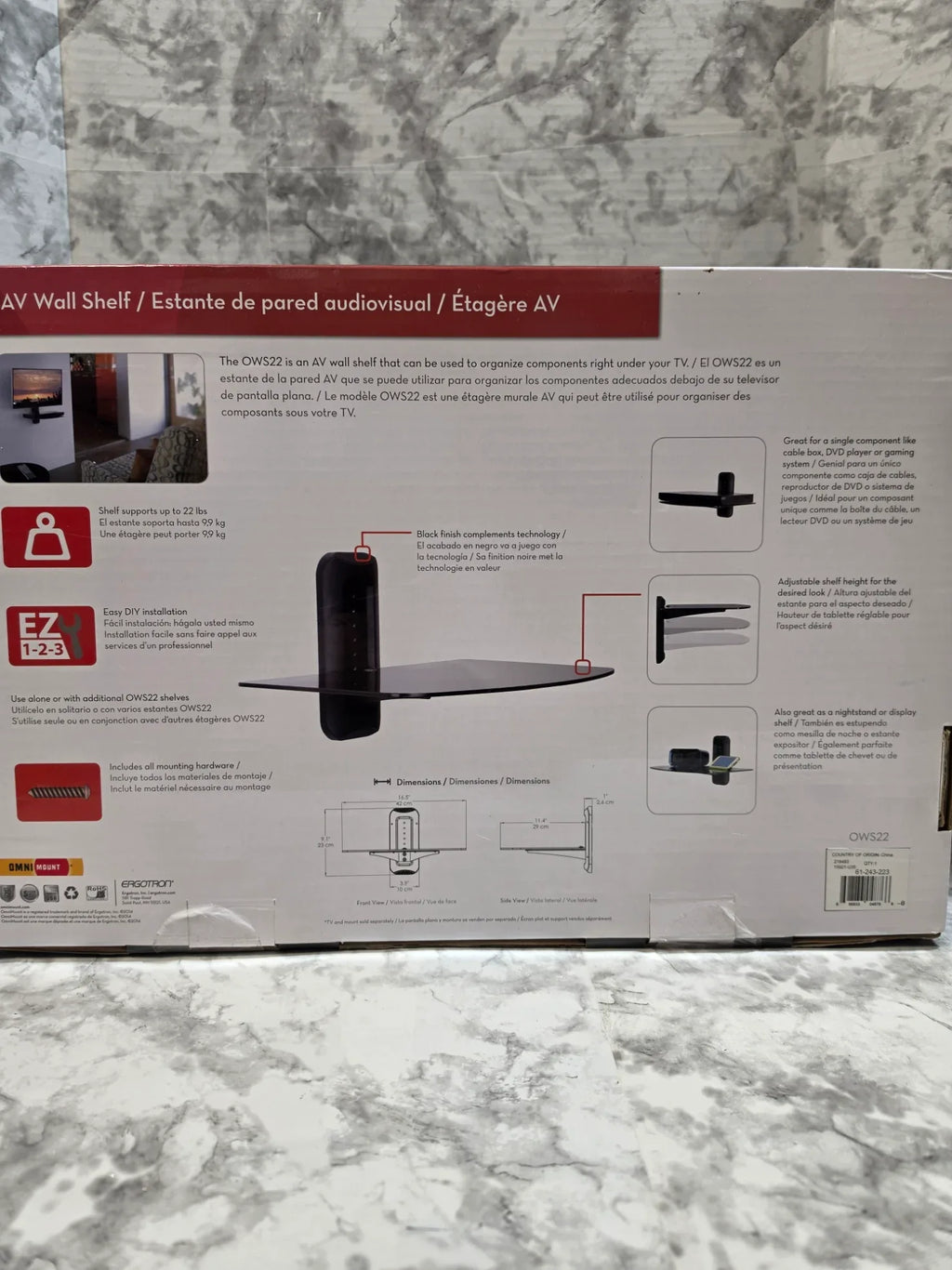 AV wall shelf packaging on a marble surface