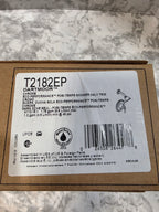 Product label with barcode and text on a cardboard backing against a marble background