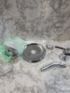 Bathroom faucet and handles on a marble countertop