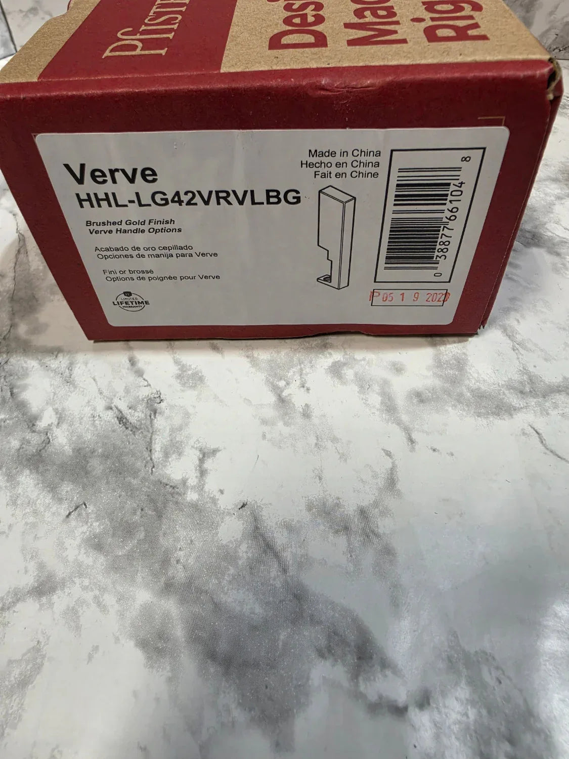 Red and white box with 'Verve' branding on a marble surface