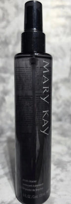 Mary Kay product on a textured gray background