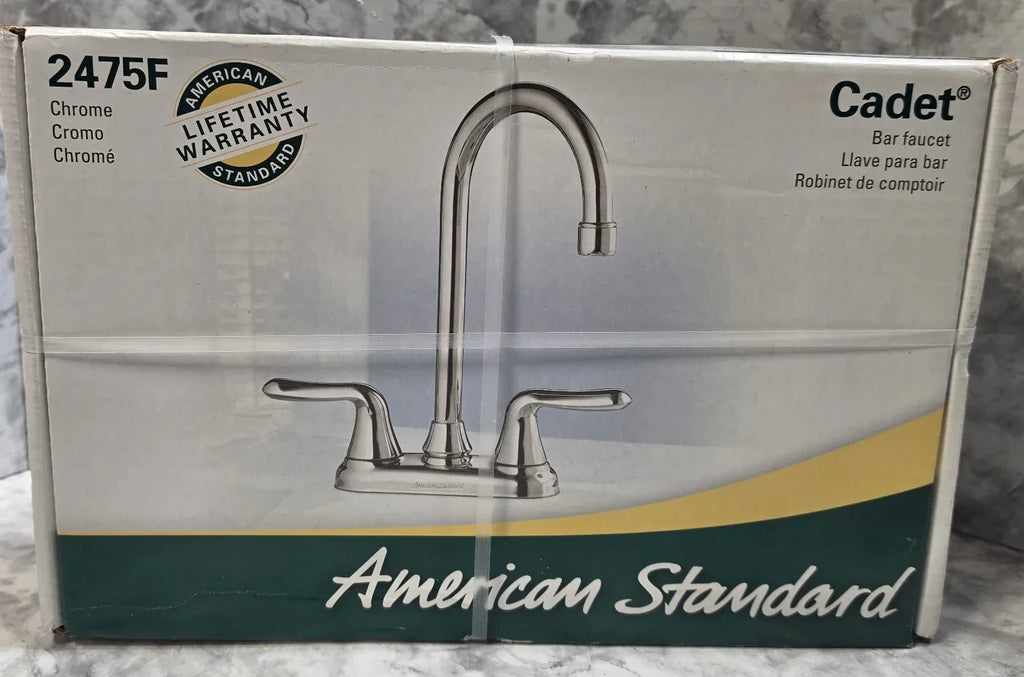 American Standard faucet packaging on a marble surface