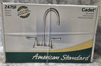American Standard faucet packaging on a marble surface