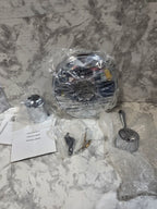 Car headlights and related parts on a marble surface