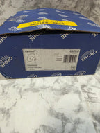 Blue Grohe packaging on a marble surface