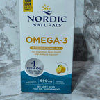 Box of Nordic Naturals Omega-3 fish oil supplement on a marble surface