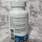 Bottle of Algae DHA on a marble surface