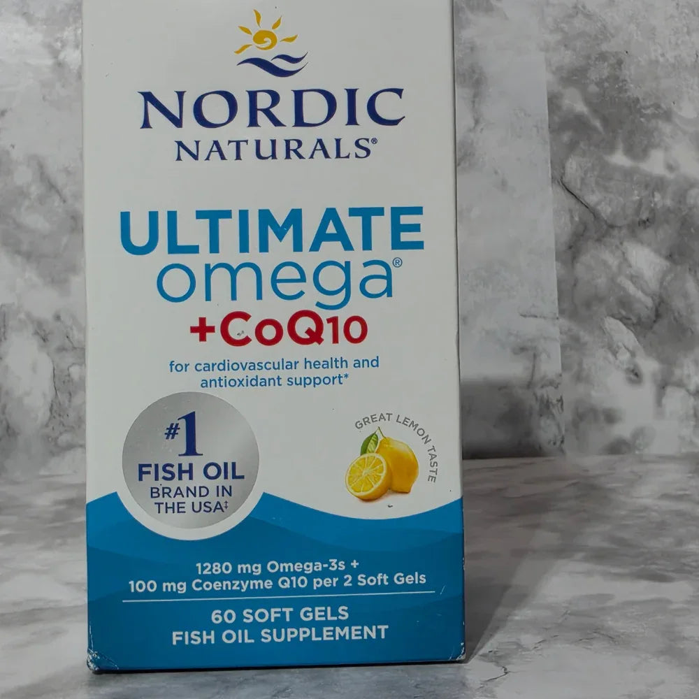Box of Nordic Naturals Ultimate Omega + CoQ10 supplement on a marble surface
