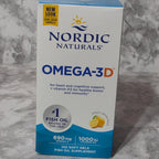 Nordic Naturals Omega-3 D supplement box on a marble surface