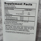 Supplement facts label on a product packaging with a gray background
