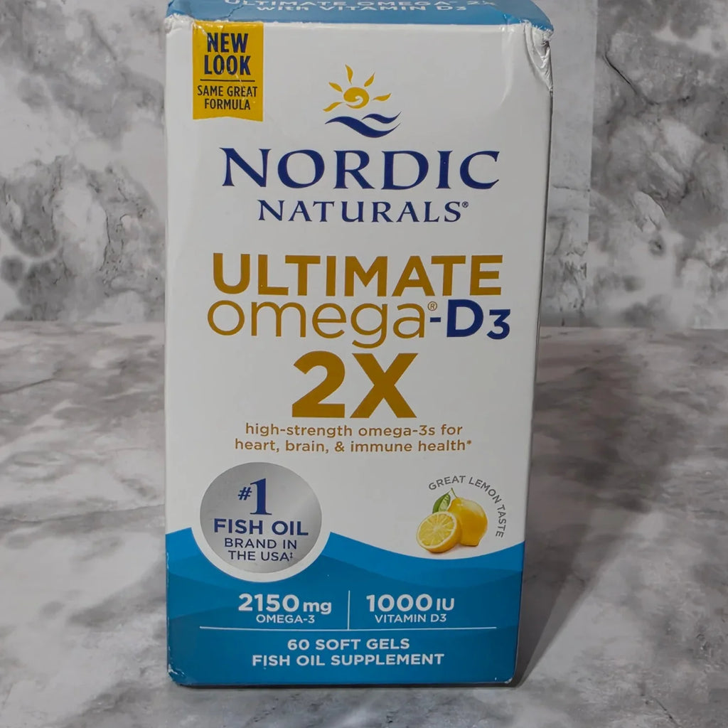 Nordic Naturals Ultimate Omega D3 2X supplement box on a marble surface