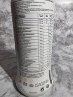 Isagenix supplement container on a marble surface