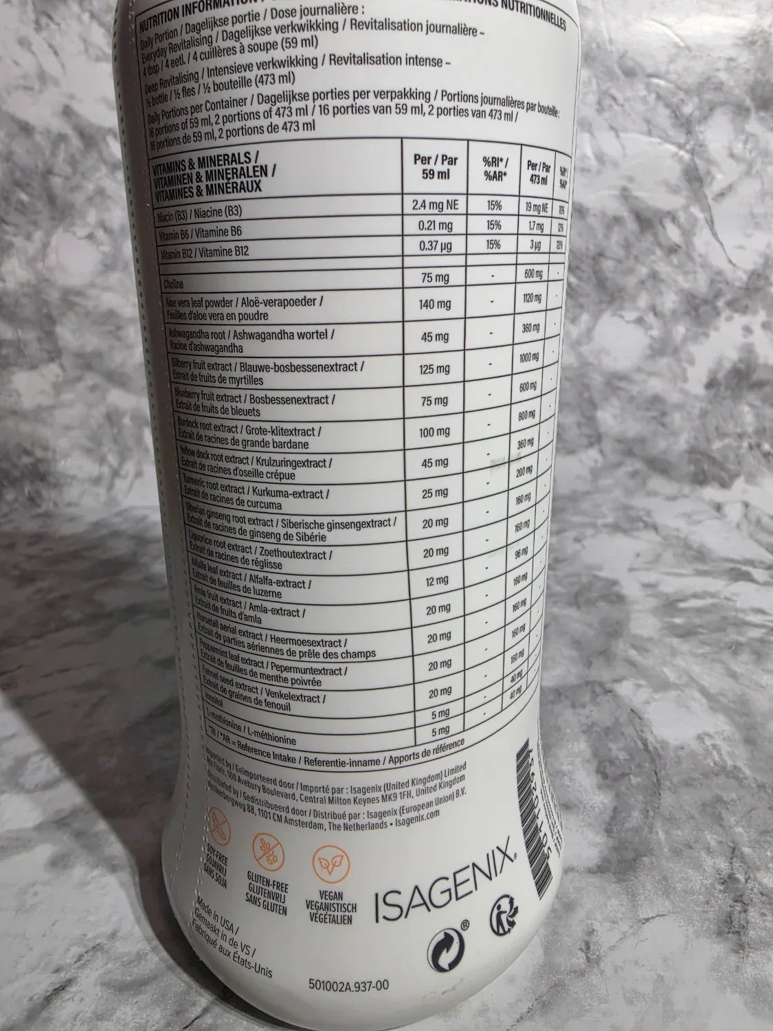 Isagenix supplement container on a marble surface