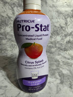 Pro-Stat medical food bottle on a marble surface