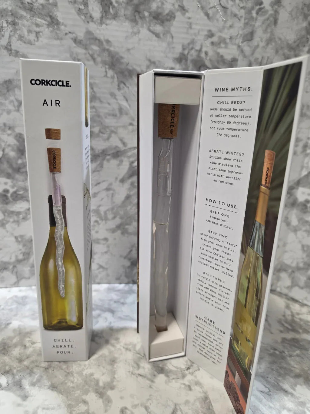 Corkcicle Air wine chiller packaging on a marble surface
