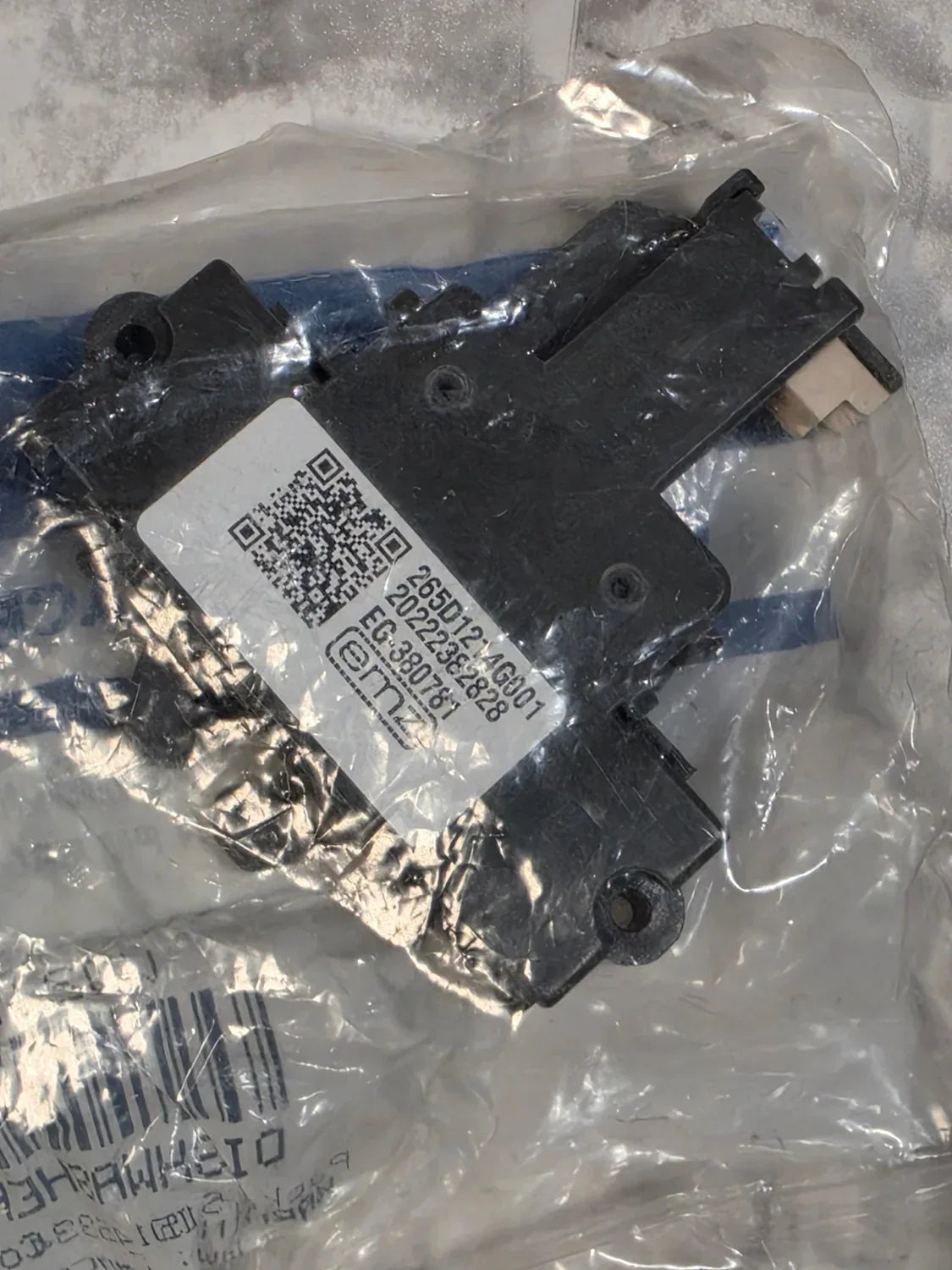 Mechanical component with a QR code label on a clear plastic bag