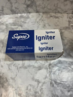 Blue and white Supco range igniter box on a marble-patterned surface