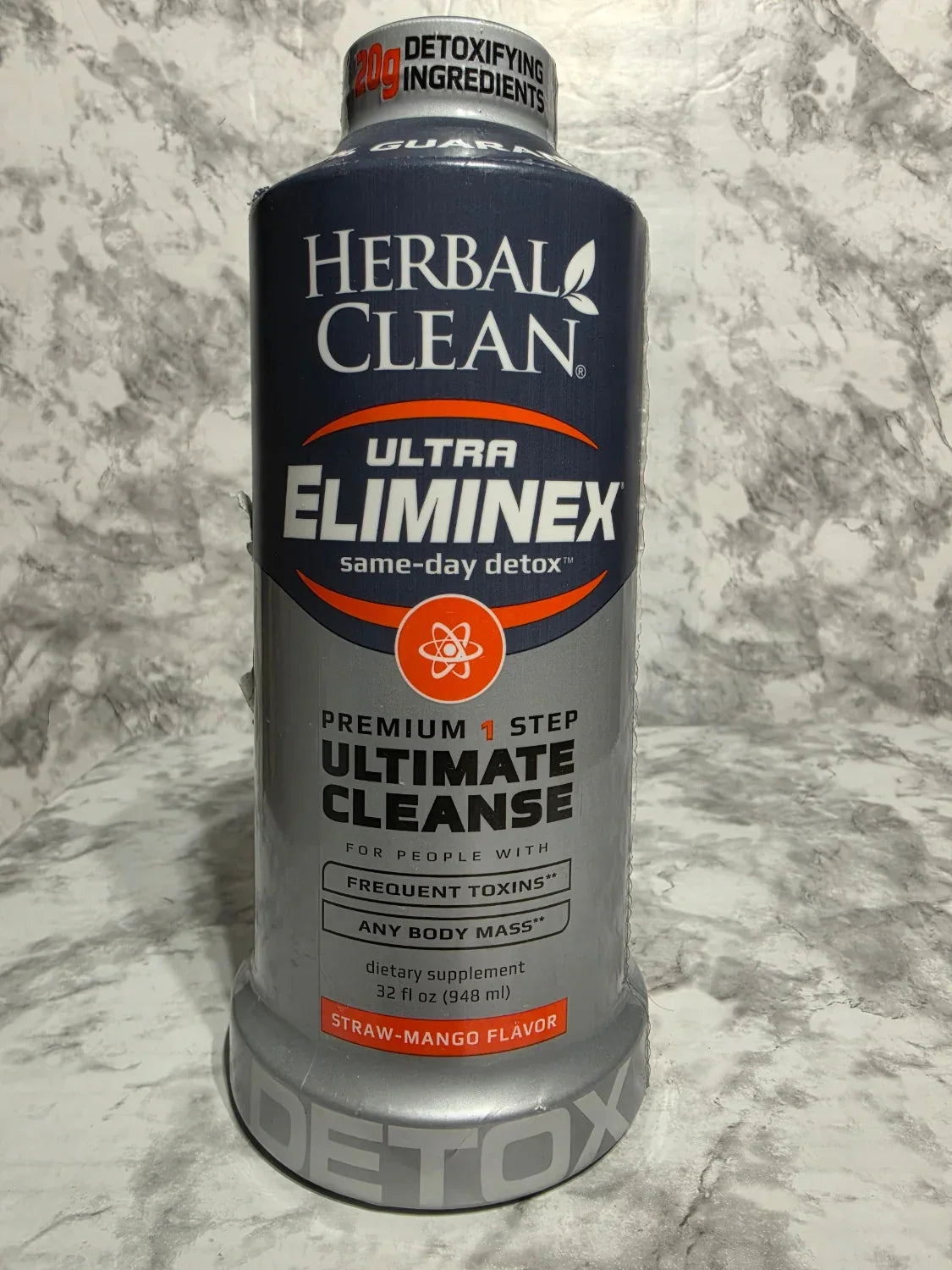 Herbal Clean Ultra Eliminex bottle on a marble surface