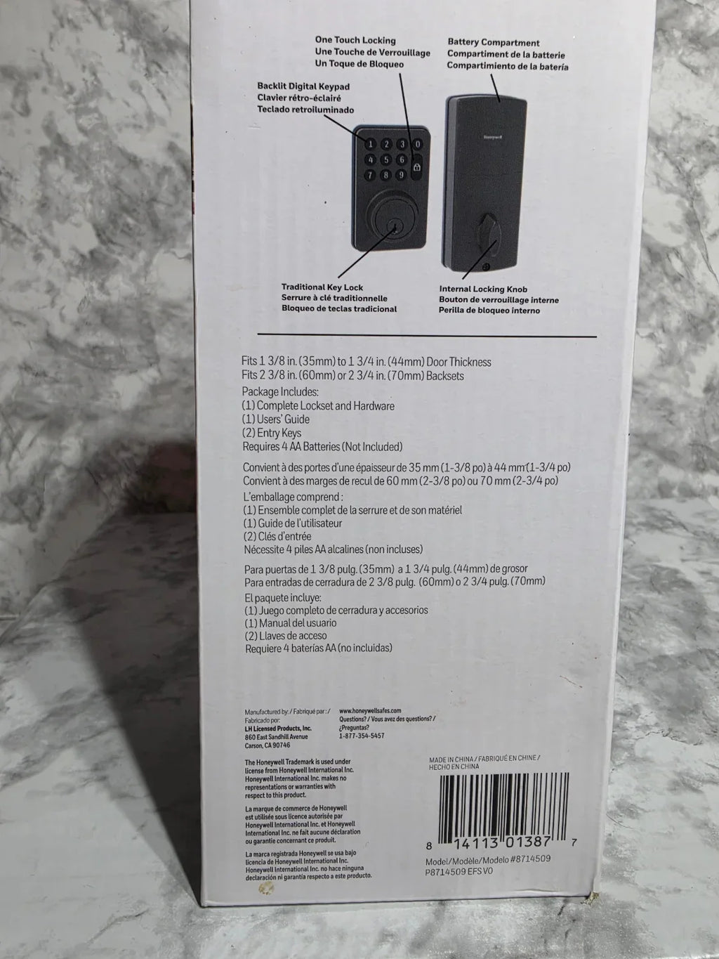 Product packaging with text and diagrams on a marble surface