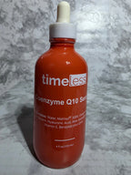 Bottle of 'timeless' serum on a marble surface