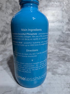 Blue bottle with text on a gray textured background