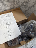Actual American Standard Reliant 3 chrome faucet in its opened original box, with bagged components and M968889 installation instructions; carton edges show wear