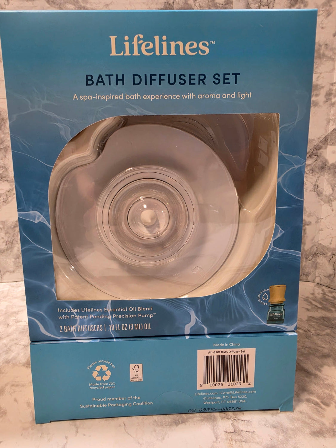 Lifelines bath diffuser set packaging on a marble surface