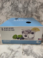 Box of Anchor Hocking glassware on a marble surface