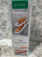 youCopia egg dispenser packaging on a marble surface