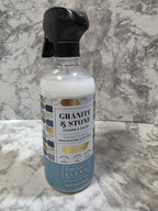 Bottle of Granville & Stone cleaner on a marble surface